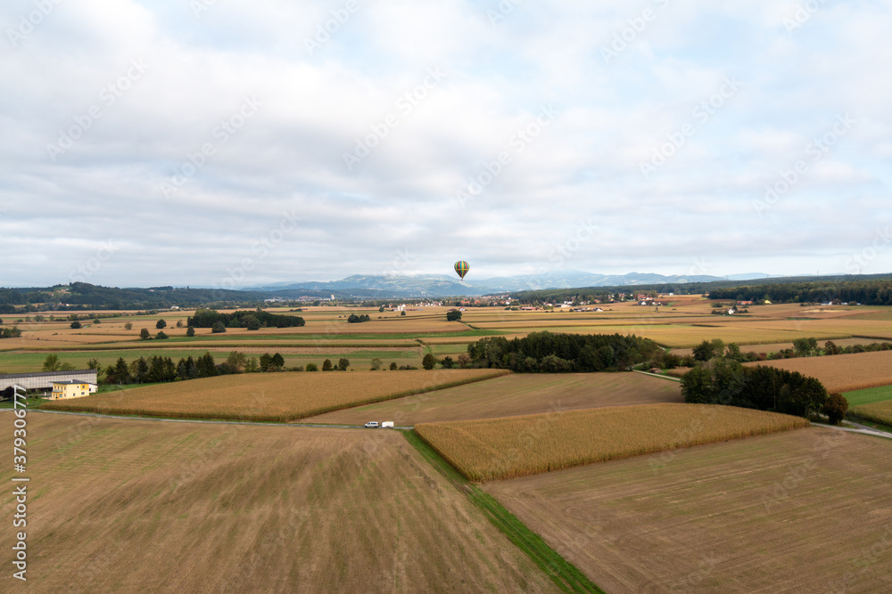 Balloon in the air over the landscape
