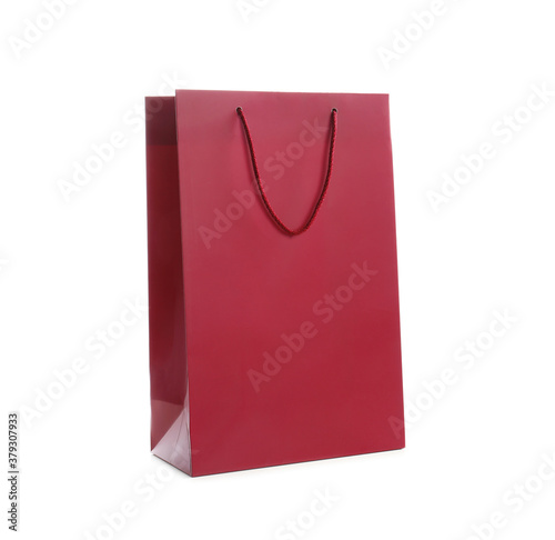 Burgundy paper shopping bag isolated on white