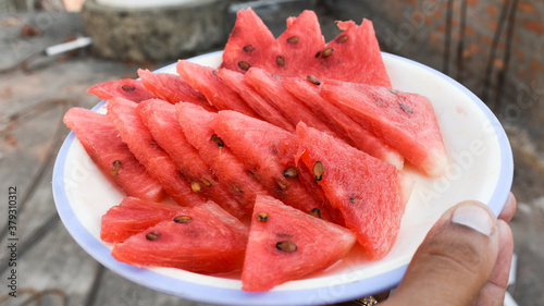  Fresh and sweet watermelon Slices on white plate