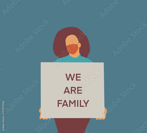 Woman wear a hygienic mask holding sign"We are family" Stop racism motivational poster against racism and discrimination.Black lives matter