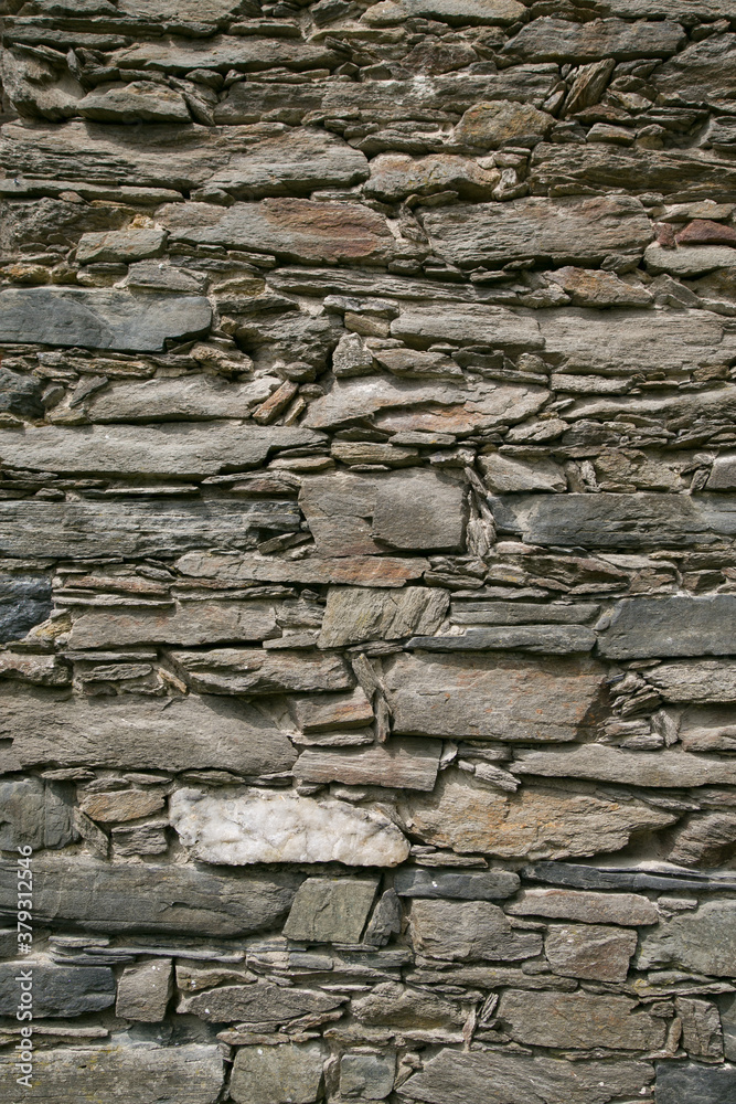 Vertical picture of decorative stone wall for background Vertical picture of decorative stone wall for background