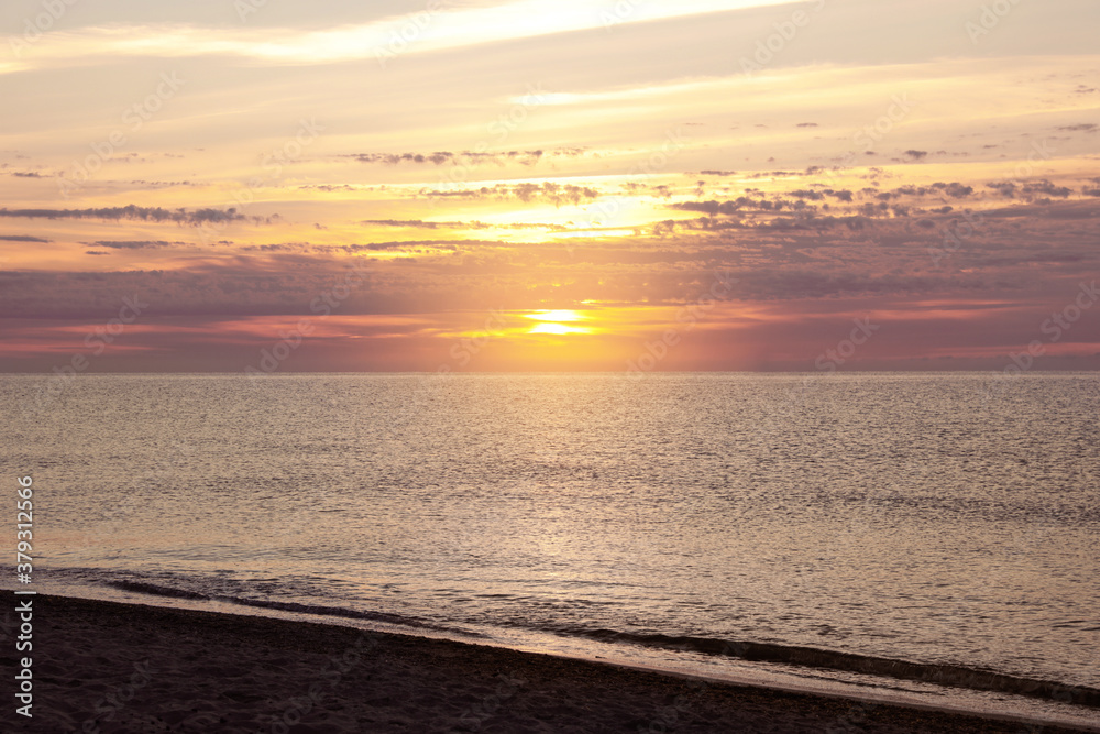Fototapeta premium Picturesque view of beautiful sea at sunset. Summer vacation