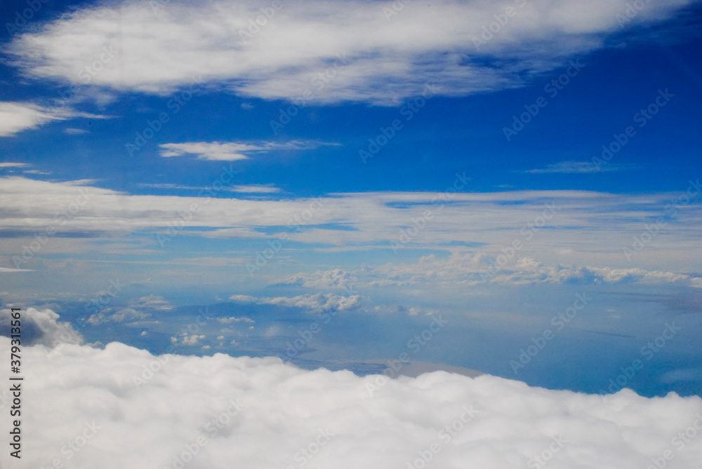 Clouds and sky from airplane window view