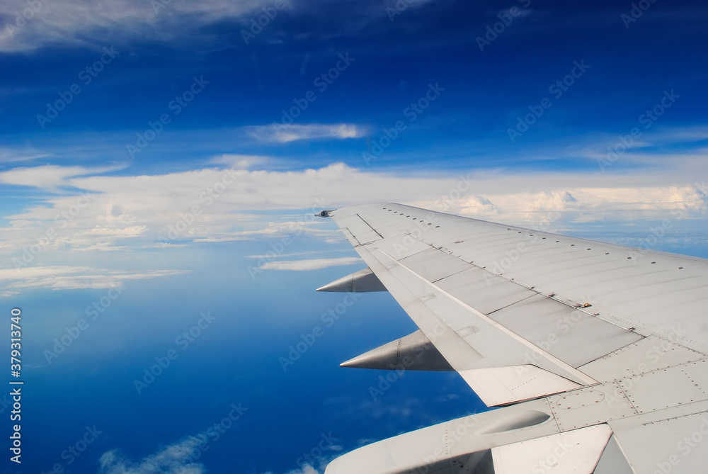 Clouds and sky from airplane window view