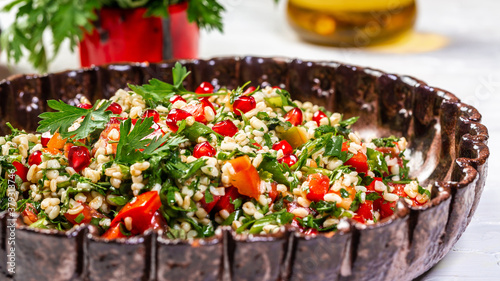 salad with bulgur and vegetables, Tabbouleh, Middle eastern or arab dishes and assorted meze and snacks tabbouleh vegetable salad