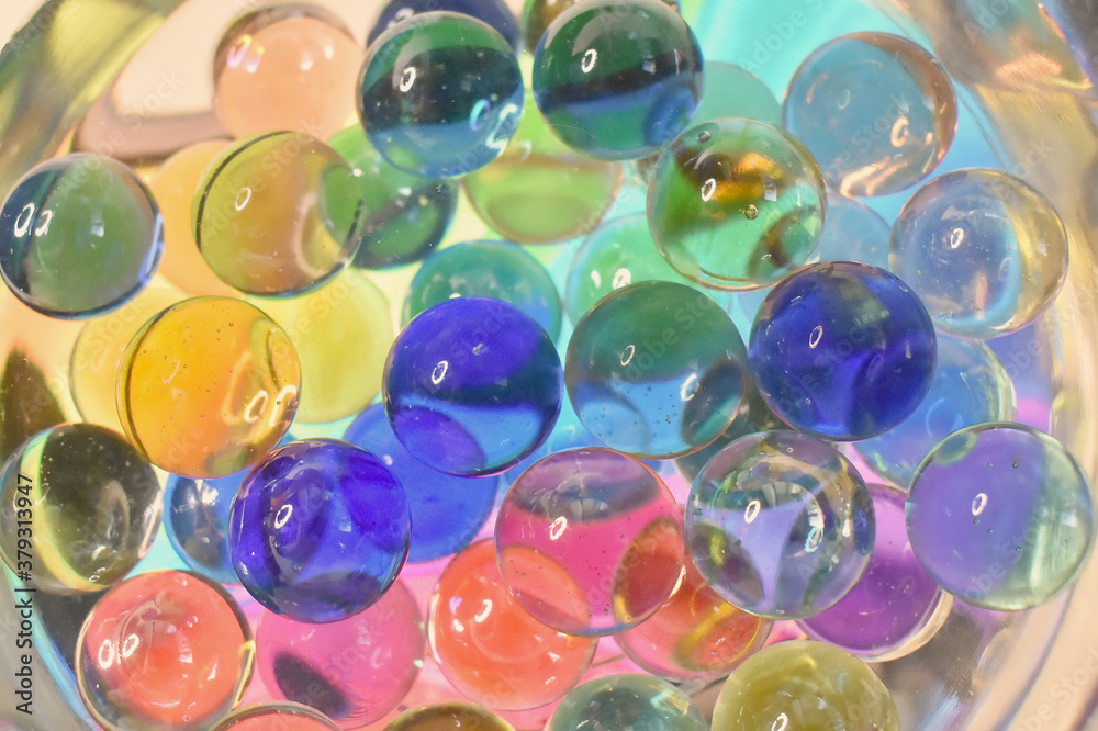 Bright abstract background balls in water. Abstract painting. Figures from glass in water. Bright abstract background balls in water. Abstract painting. Figures from glass in water.