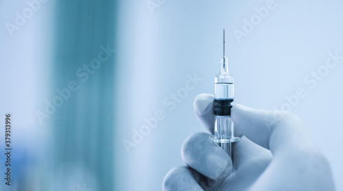 Vaccine coronavirus deverlopment vial dose flu shot drug needle syringe,medical concept vaccination hypodermic injection treatment disease care hospital prevention immunization illness disease.