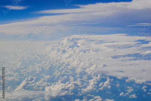 Clouds and sky from airplane window view