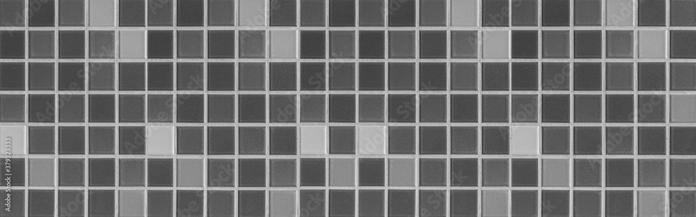 Panorama of White and Black mosaic tiles wall pattern and seamless background Panorama of White and Black mosaic tiles wall pattern and seamless background