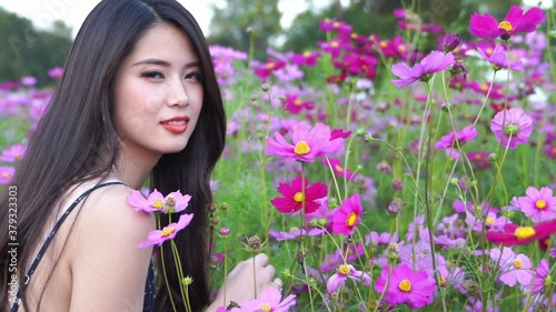 girl with flowers in the field