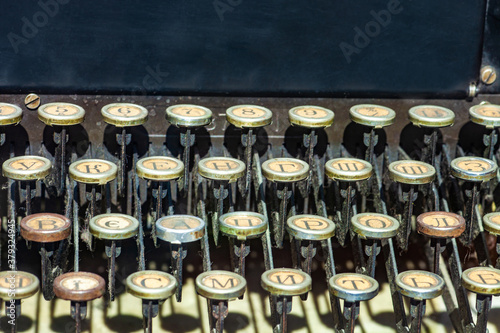 Closeup vintage typewriter keys, selective focus