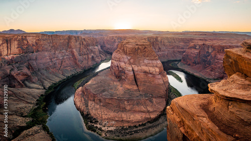 Nice View of Horseshoe bend sunset times during summer season . One of the most famous nature places in Arizona and locate near the town name Page , Arizona , United States of America