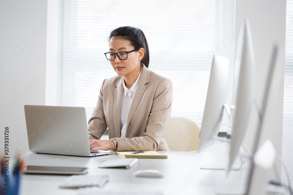 Portrait of asian business woman at workplace in office Portrait of asian business woman at workplace in office