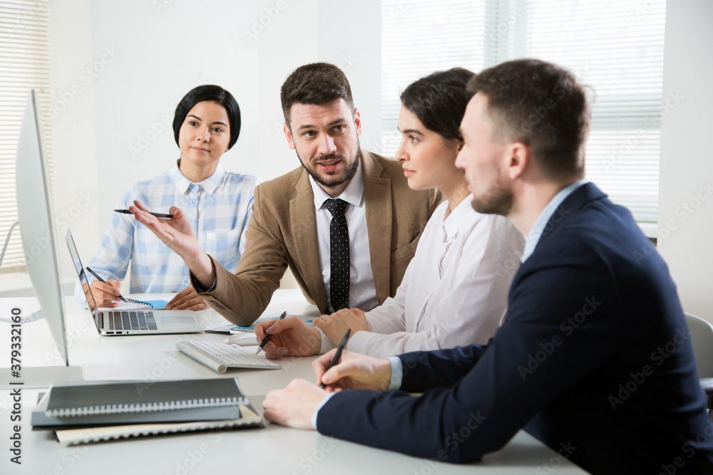 Business people working together in the office Business people working together in the office