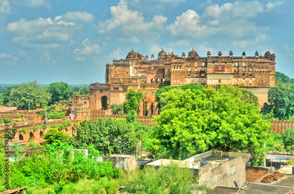 Orchha Fort Jahangir Mahal, ancient ruins in India wiev from distance