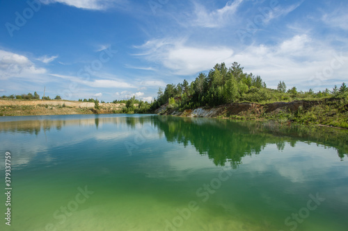 Blue water kaolin quarry lake pond