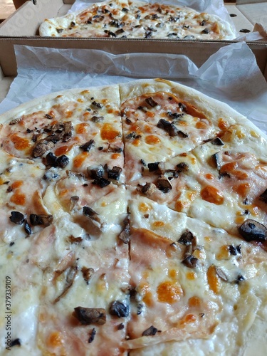 Mushroom pizza with bacon close-up