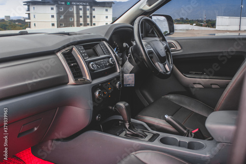 Fototapeta Naklejka Na Ścianę i Meble -  Modern car interior. Steering wheel, close-up