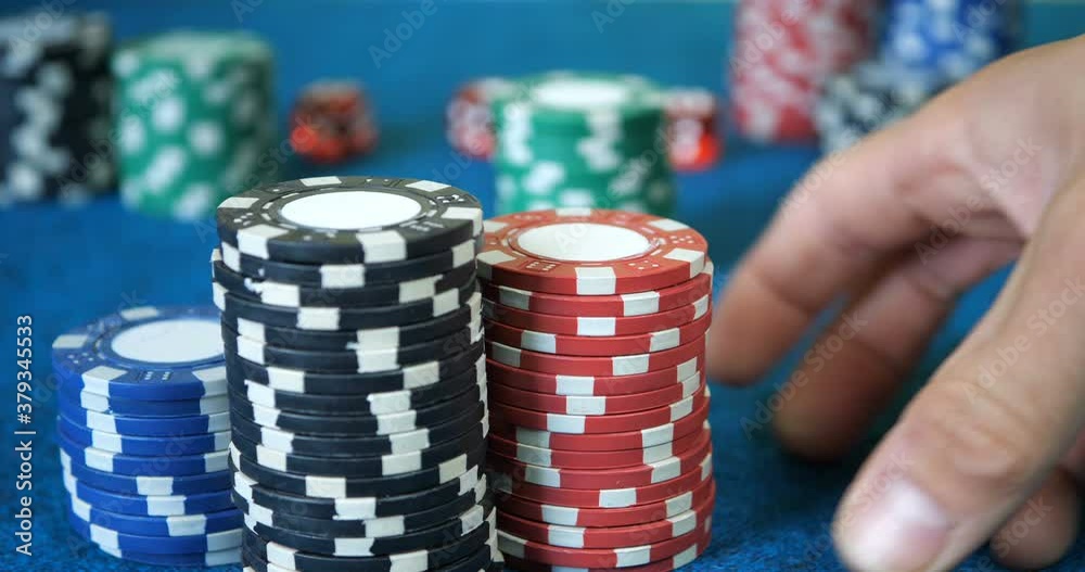 poker chips of different denominations.slow motion poker chips of different denominations.slow motion