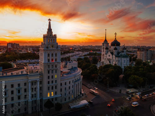Evening summer Voronezh cityscape. Annunciation Cathedral and Tower of Management of South-east railway at sunset