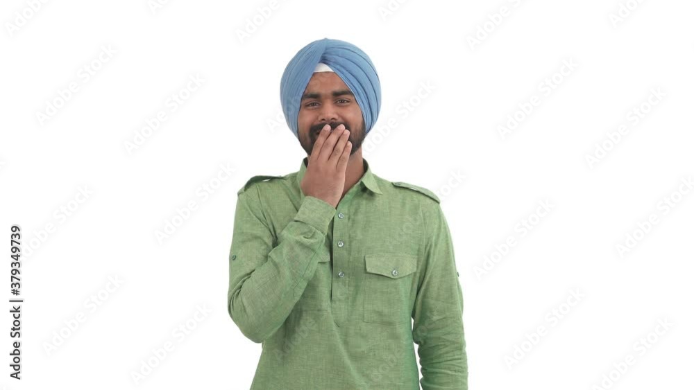 Indian beard man covering his mouth with hand and laughing at something funny. Isolated on white background Indian beard man covering his mouth with hand and laughing at something funny. Isolated on white background