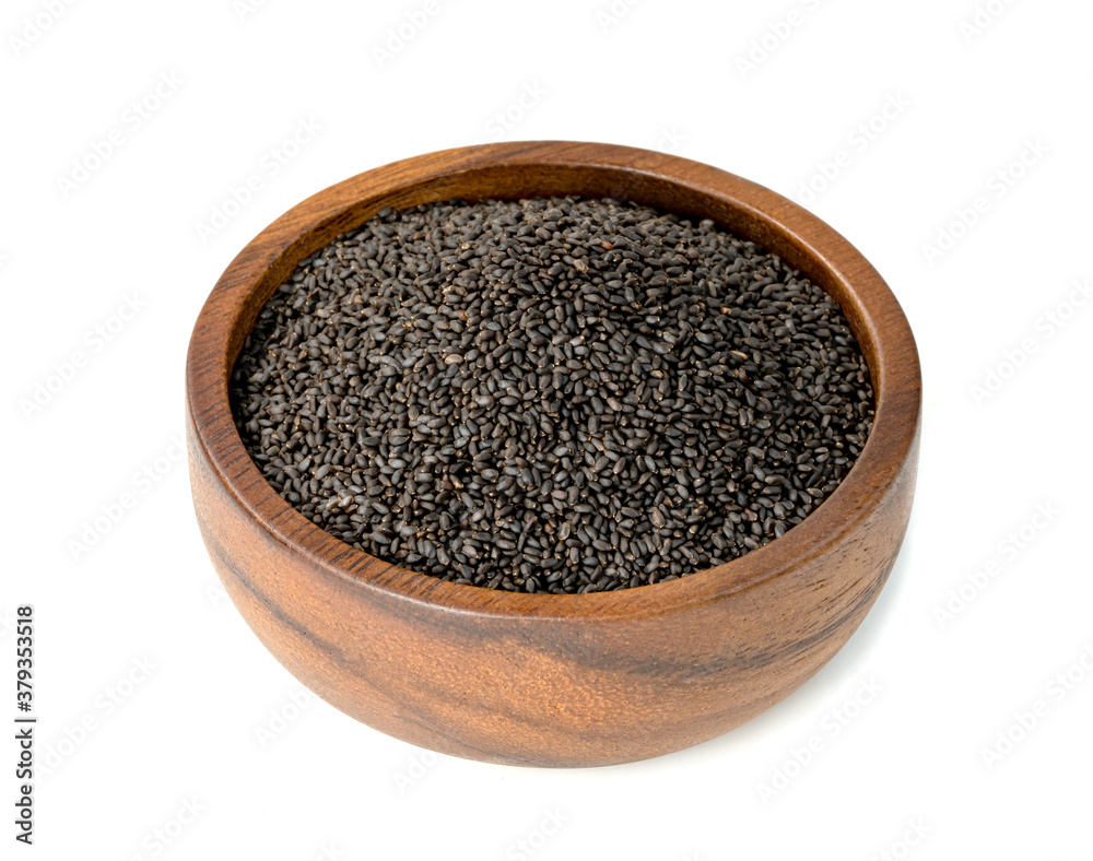 Hairy basil seeds with wooden bowl isolated on white background Hairy basil seeds with wooden bowl isolated on white background