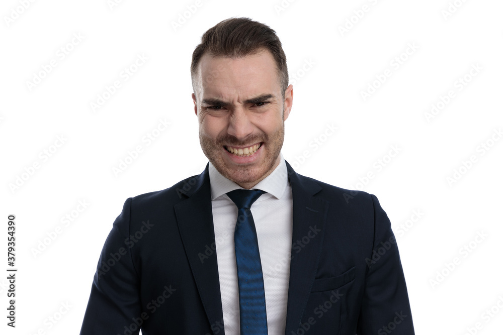 Young businessman’s reaction to someone getting hurt Young businessman’s reaction to someone getting hurt