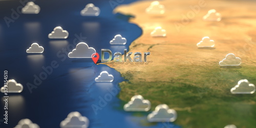 Dakar city and cloudy weather icon on the map, weather forecast related 3D rendering © Alexey Novikov