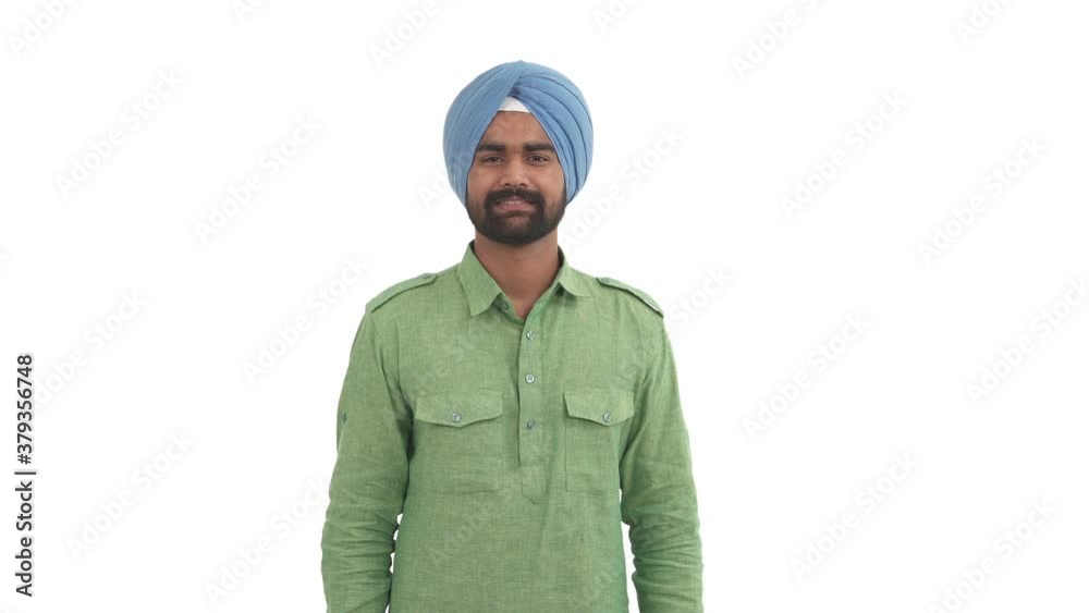 Satisfied Indian man showing OK gesture at camera. O-key sign. Isolated on white background Satisfied Indian man showing OK gesture at camera. O-key sign. Isolated on white background