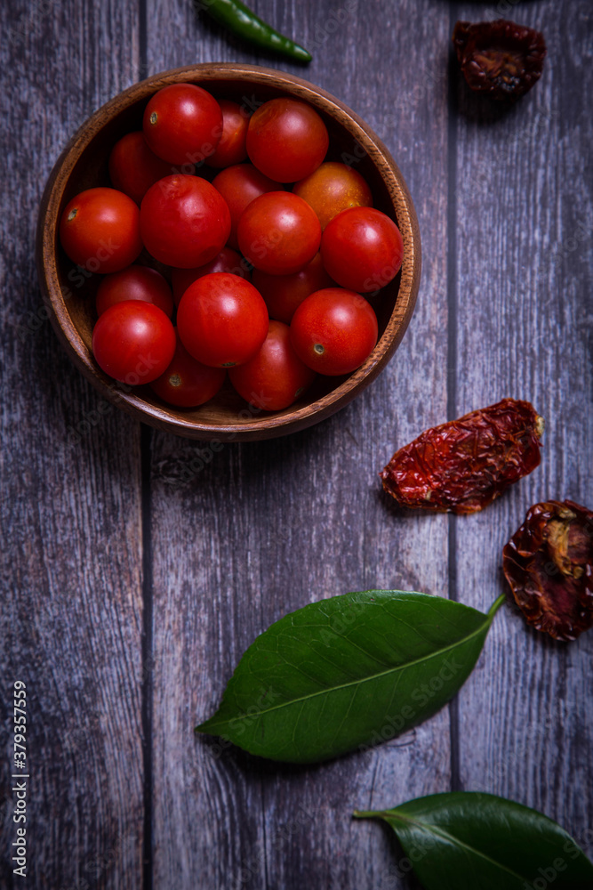 tomatoes on wooden table