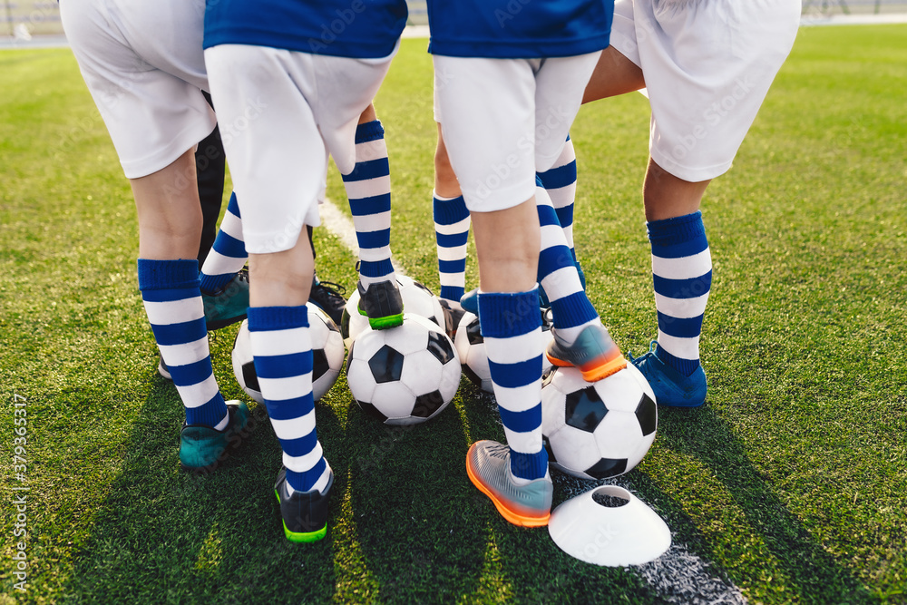 Children Football Team Players. Sports Boys in a School Team. Kids Huddling in a Team on Tournament Competition. Players Gathering Together in a Circle. Kids in Soccer Sportswear Children Football Team Players. Sports Boys in a School Team. Kids Huddling in a Team on Tournament Competition. Players Gathering Together in a Circle. Kids in Soccer Sportswear