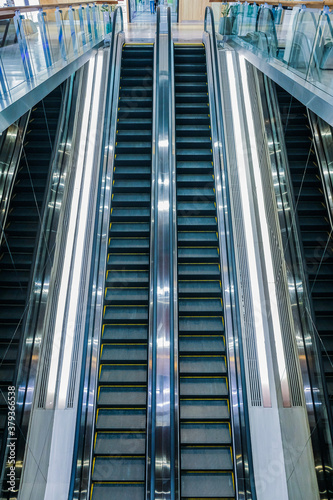 Fototapeta Naklejka Na Ścianę i Meble -  Modern luxury escalators with staircase at airport