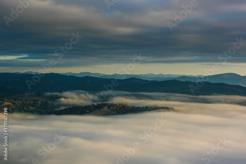 sunrise over the mountains with clouds