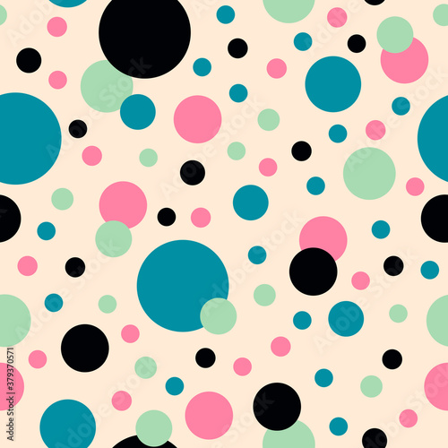 Abstract seamless pattern. Pink, blue, black circles on a pale background. For prints of fabric, packaging, textile products.