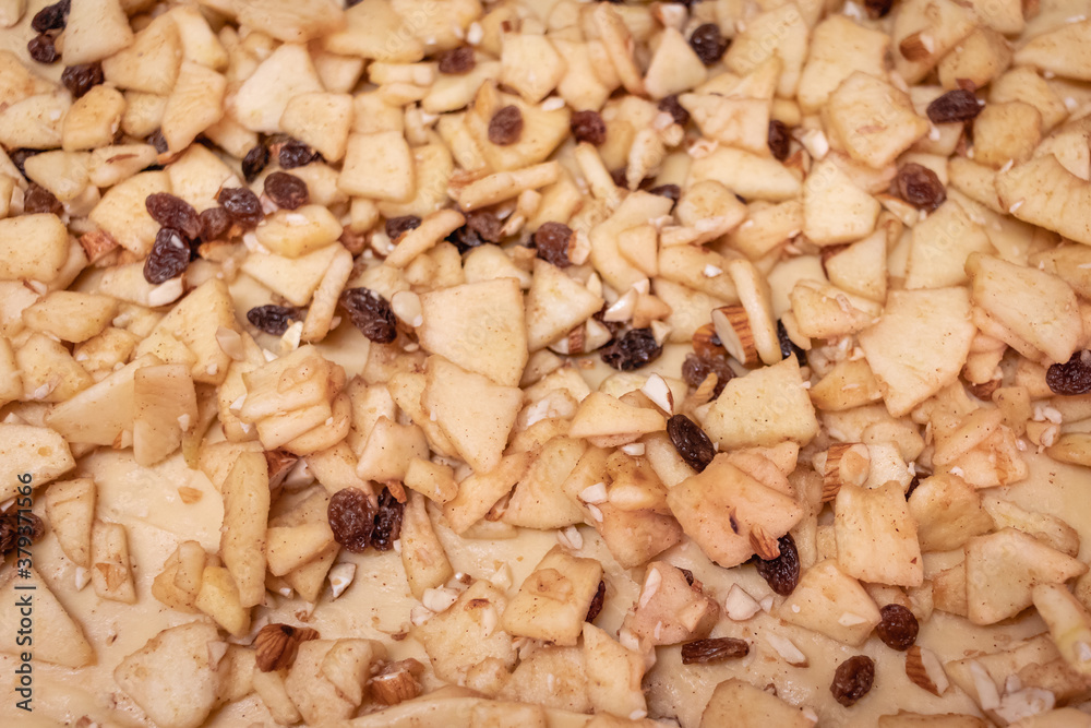 strudel dough stuffed with raisin, pine nuts, cinnamon and apple strudel dough stuffed with raisin, pine nuts, cinnamon and apple