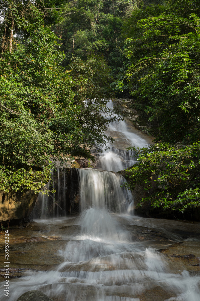 Beautiful rainforest waterfall in slow shutter mode.