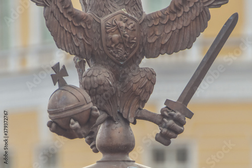 three-headed eagle with sword and sceptre of power symbol of tsarist Russia photo