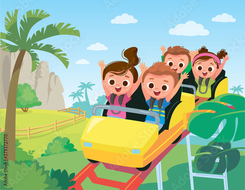 Roller-coaster. Children ride on roller-coaster in amusement park. Children have fun in amusement park. Roller coaster. Exhilarating rides.
