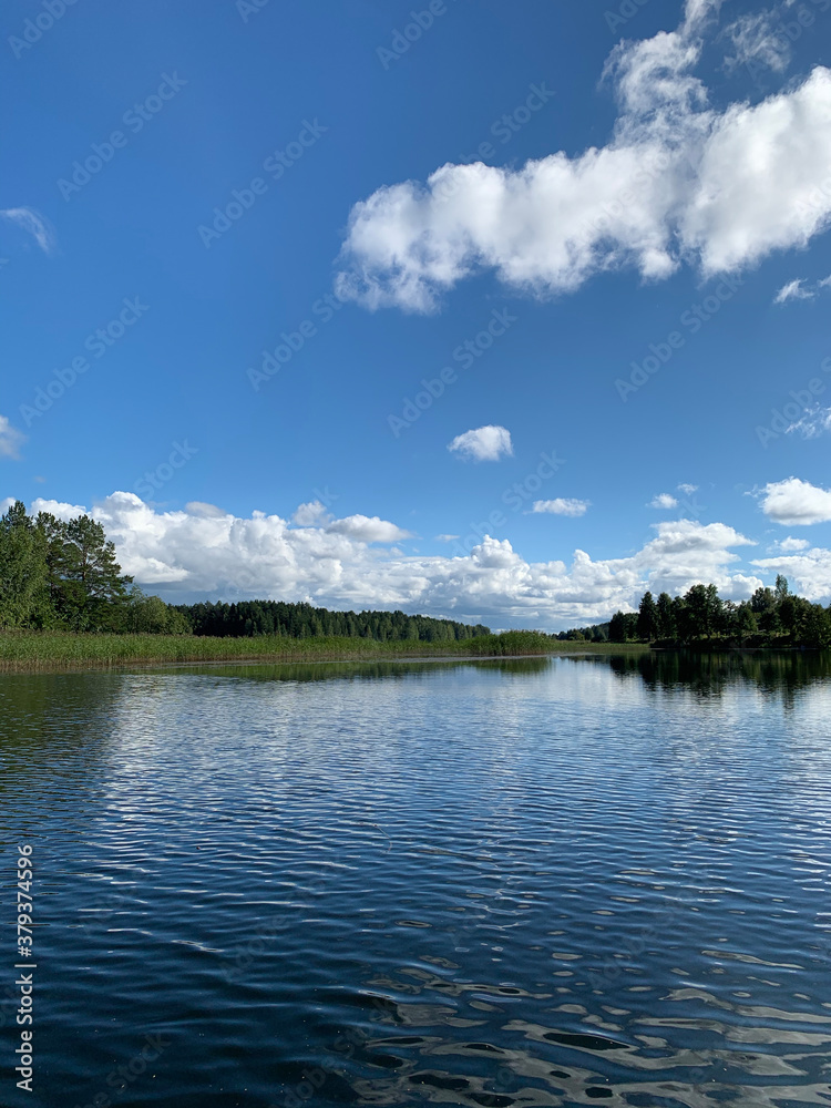Fototapeta premium clouds over the river