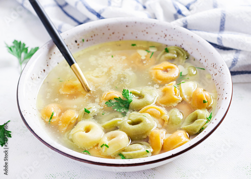 Tortellini in broth, italian traditional dish. Italian pasta.