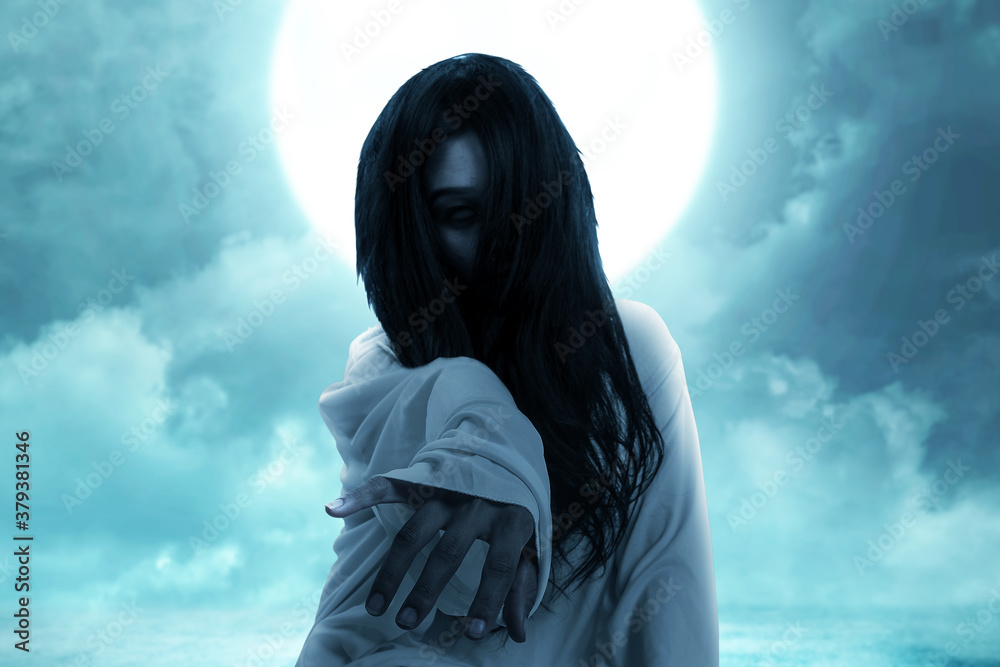 Scary ghost woman crawling with night scene background Scary ghost woman crawling with night scene background