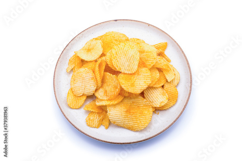 Potato chips in plate beautiful shape on white background