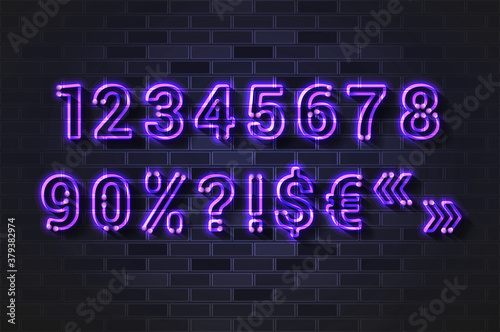 Glowing violet neon lamp numbers and special characters on a black brick wall
