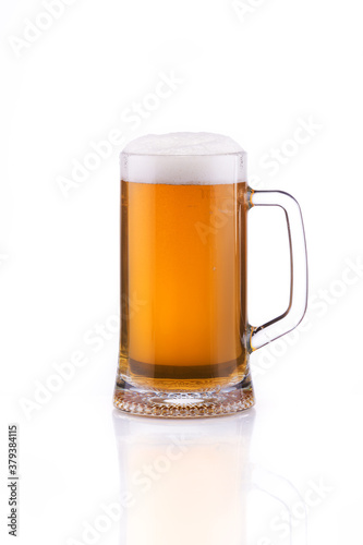fine fresh beer in a beautiful transparent mug