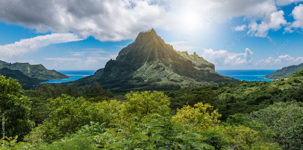 Panoramic mountain peak landscape with Cook's Bay and Opunohu Bay on the tropical Island of Moorea,  French Polynesia. - obrazy, fototapety, plakaty 