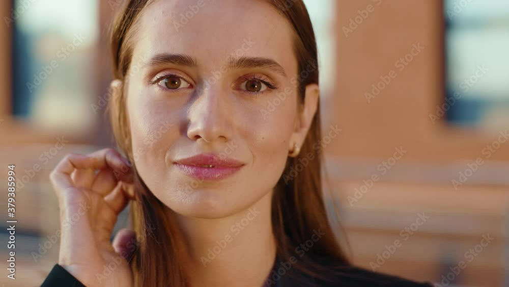 Face portrait beautiful woman look at camera smiling feel happy outdoors young modern business corporate attractive slow motion Face portrait beautiful woman look at camera smiling feel happy outdoors young modern business corporate attractive slow motion