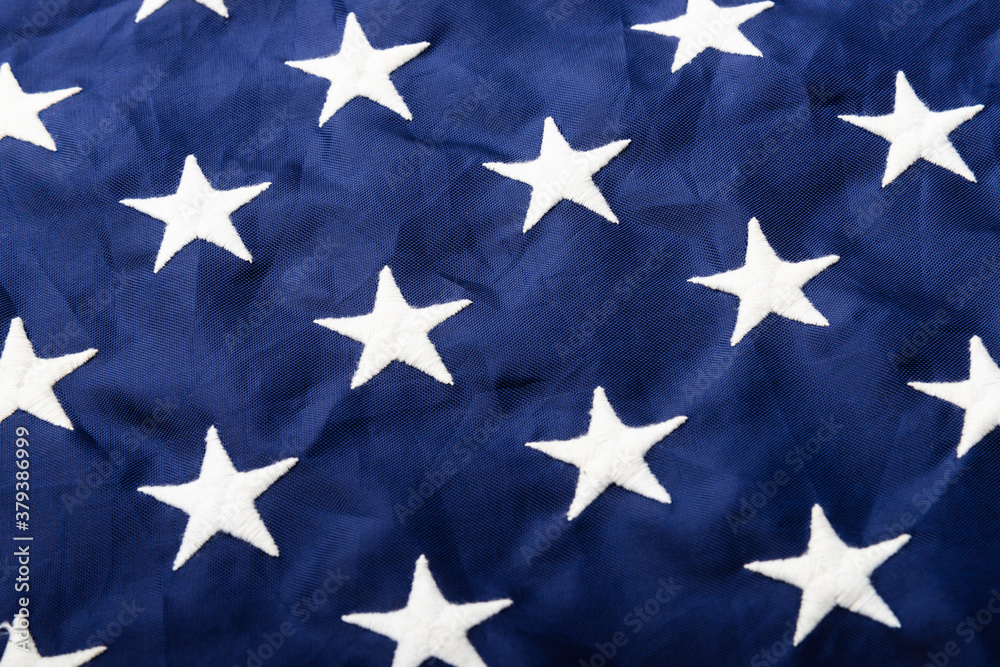 Full frame of white stars on blue of the America United States flag, symbolizing background for use, Veterans or Independence day concept Full frame of white stars on blue of the America United States flag, symbolizing background for use, Veterans or Independence day concept