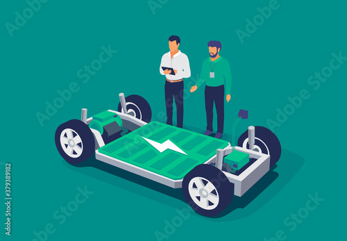 Electric car chassis battery platform skateboard module pack board. Automobile engineers working with tablet computer solving problem. Vehicle components battery pack, motor powertrain, controller.