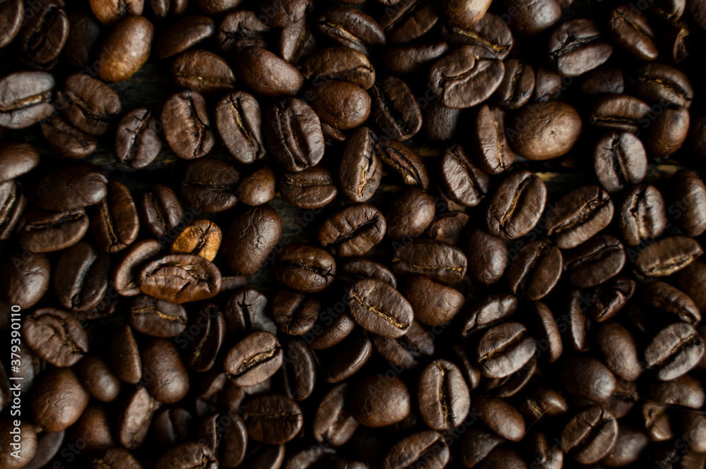 Fresh arabica coffee beans as a texture or background. Fresh arabica coffee beans as a texture or background.