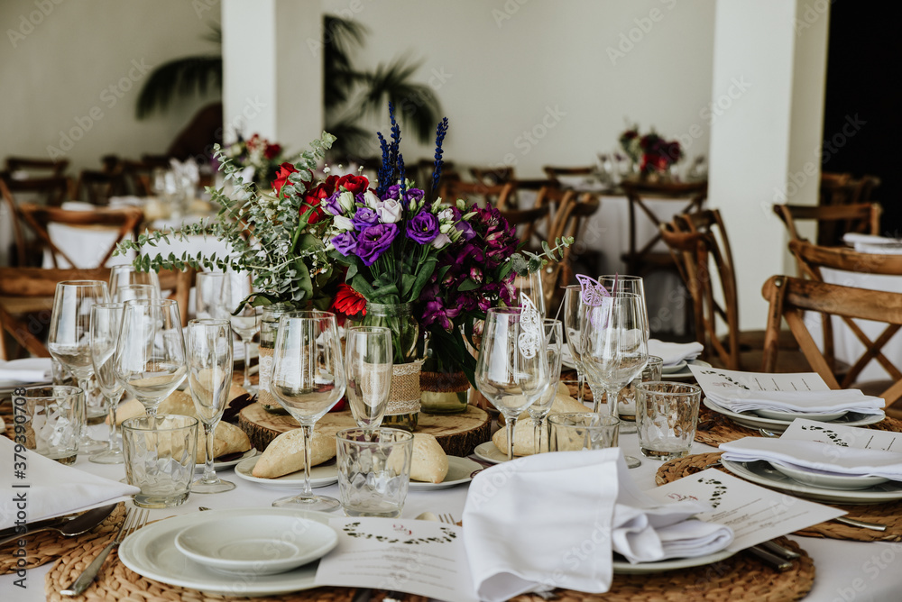 Fototapeta premium table setting for a dinner. Tables set up for a day wedding